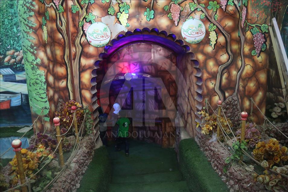 Syrian children at underground amusement park in Syria