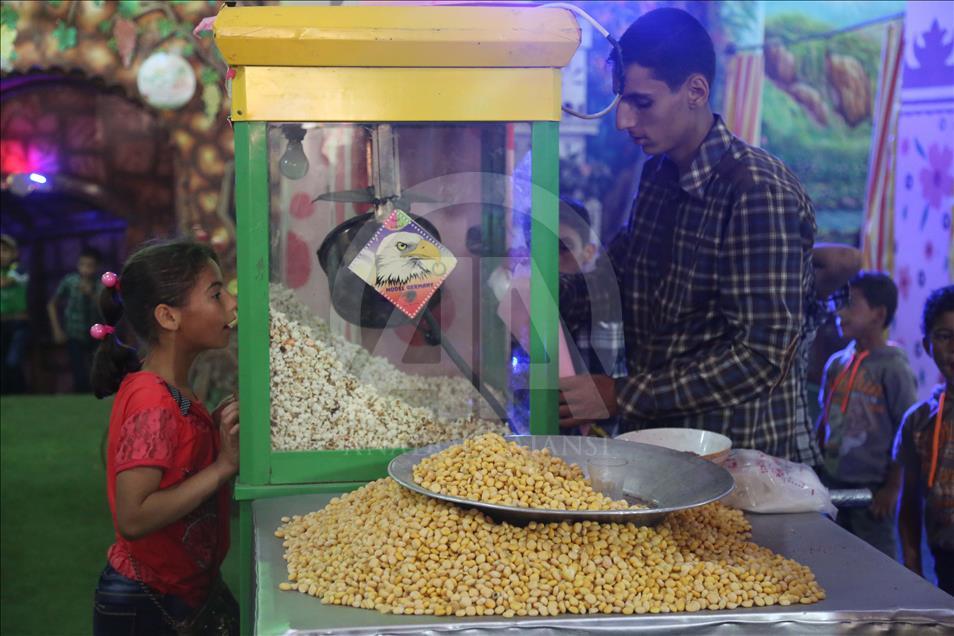 Syrian children at underground amusement park in Syria
