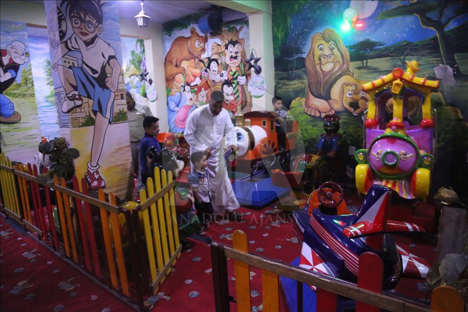 Syrian children at underground amusement park in Syria