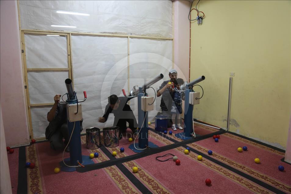 Syrian children at underground amusement park in Syria