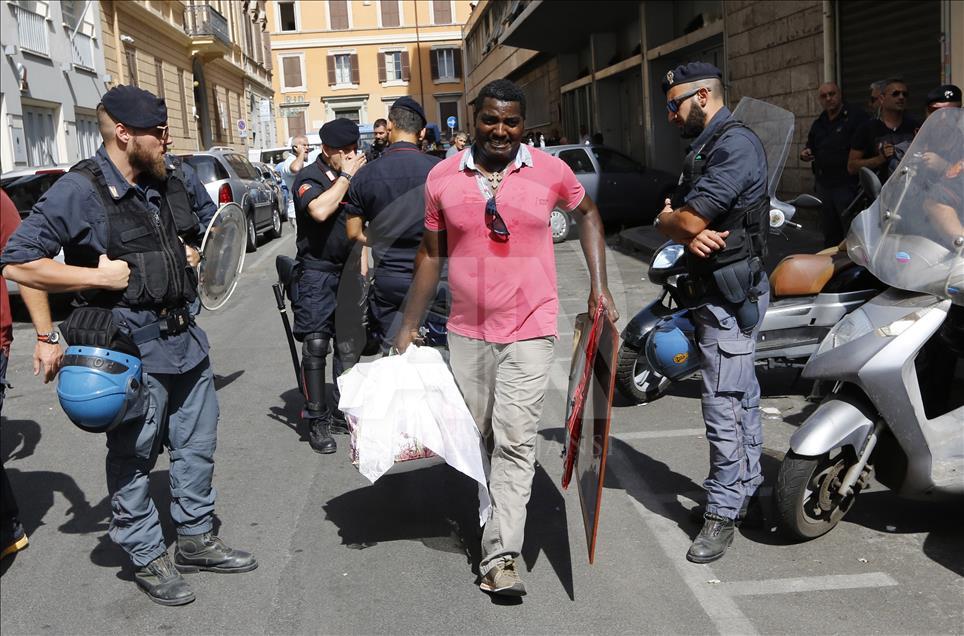Migrants, refugees and asylum seekers cleared by police in Rome