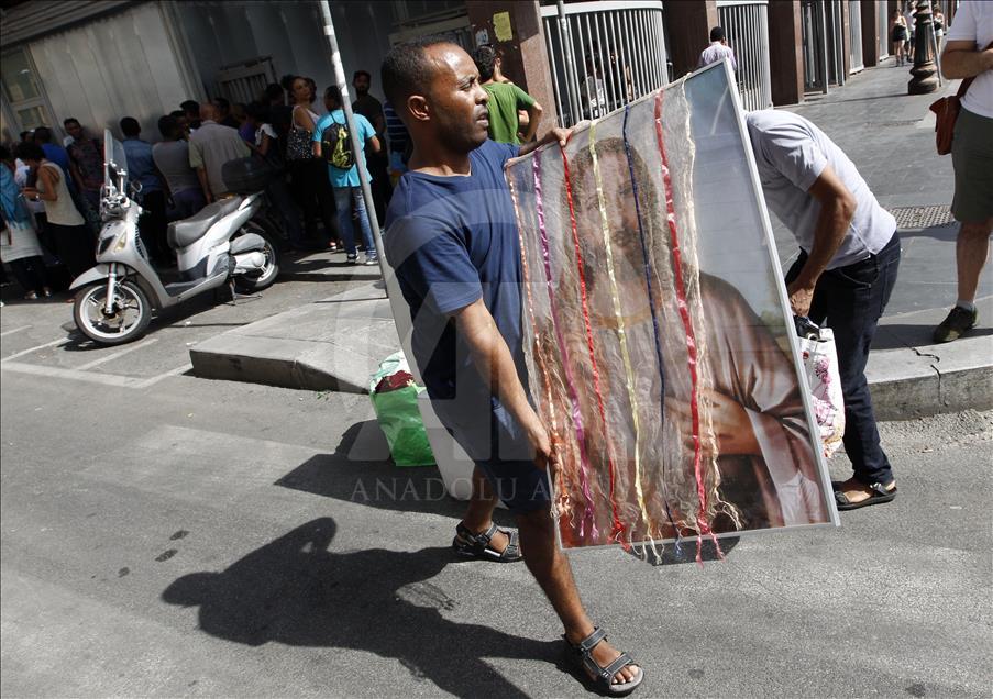 Migrants, refugees and asylum seekers cleared by police in Rome