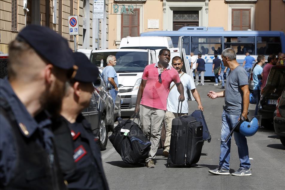 Migrants, refugees and asylum seekers cleared by police in Rome