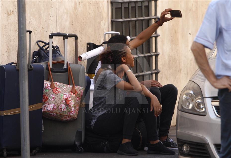 Migrants, refugees and asylum seekers cleared by police in Rome