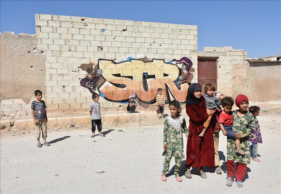Türk grafiti sanatçılarından Suriye'de anlamlı çizimler