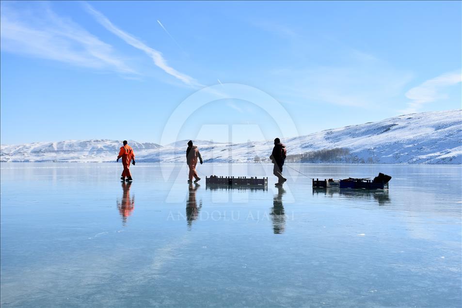 Ice fishing on Lake Hamurpet in Turkey