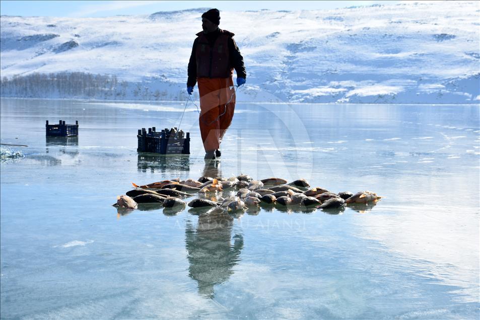 Ice fishing on Lake Hamurpet in Turkey