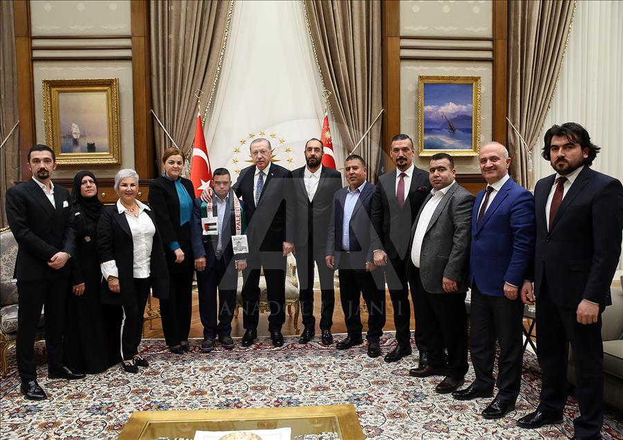 President Erdogan receives Palestinian with Down syndrome 