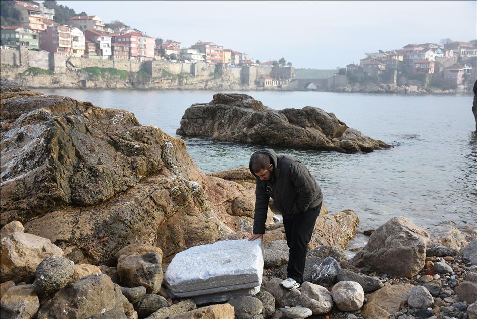 Storm washes up Roman sarcophagus