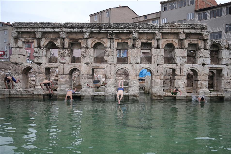 Joy of swimming in 2,000-year-old bath in mid-winter