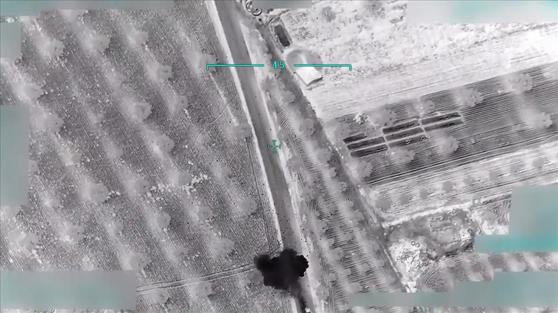 Drone films terrorists plant bombs to kill civilians