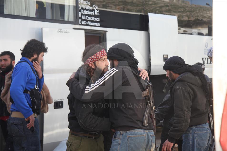 Syrian civilians are evacuated from Al Qadam region of Damascus