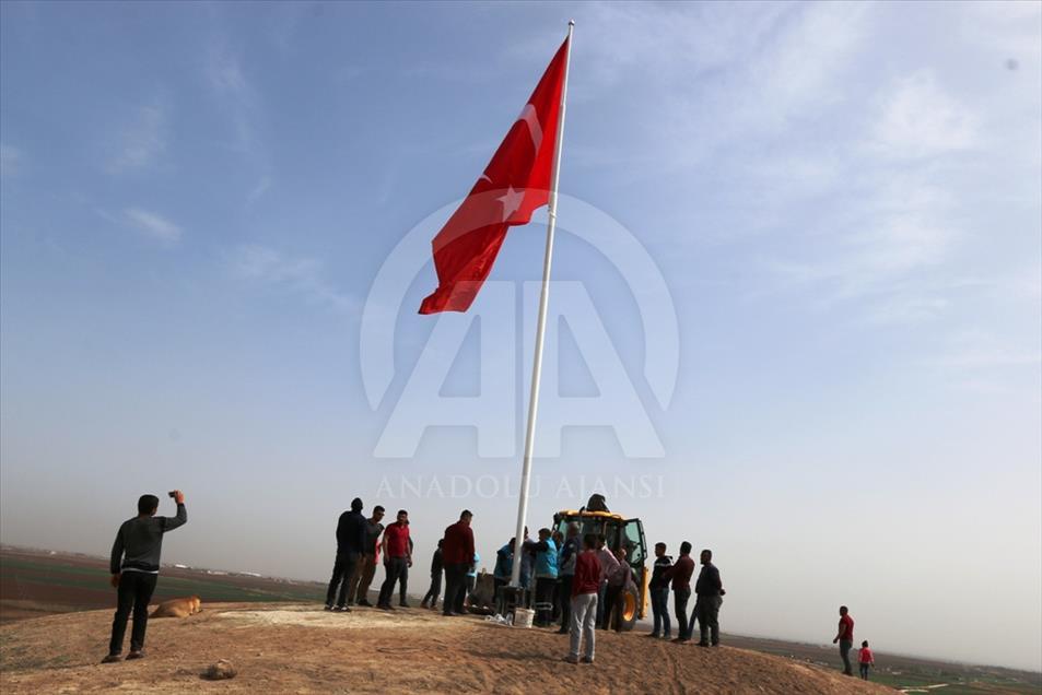 Giant Turkish flags on Syria border