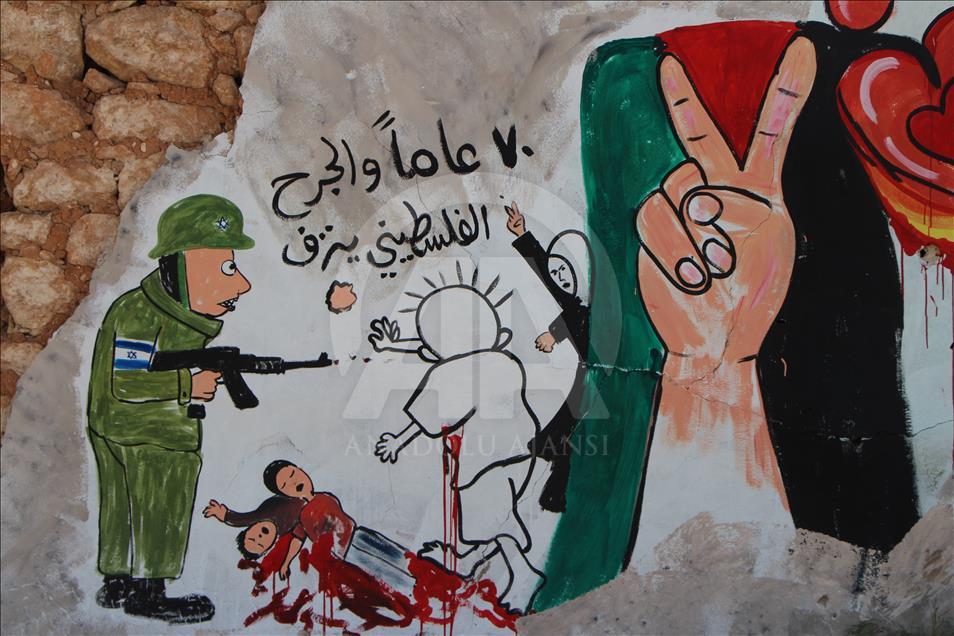 Sirijac grafitima na ruševinama Idliba šalje podršku Palestini