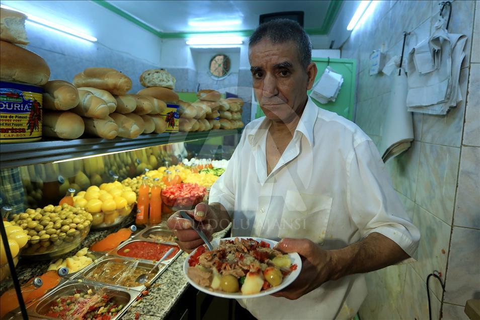 "الصحن التونسي".. طبق بكل الألوان يجمع الفقراء والأغنياء
