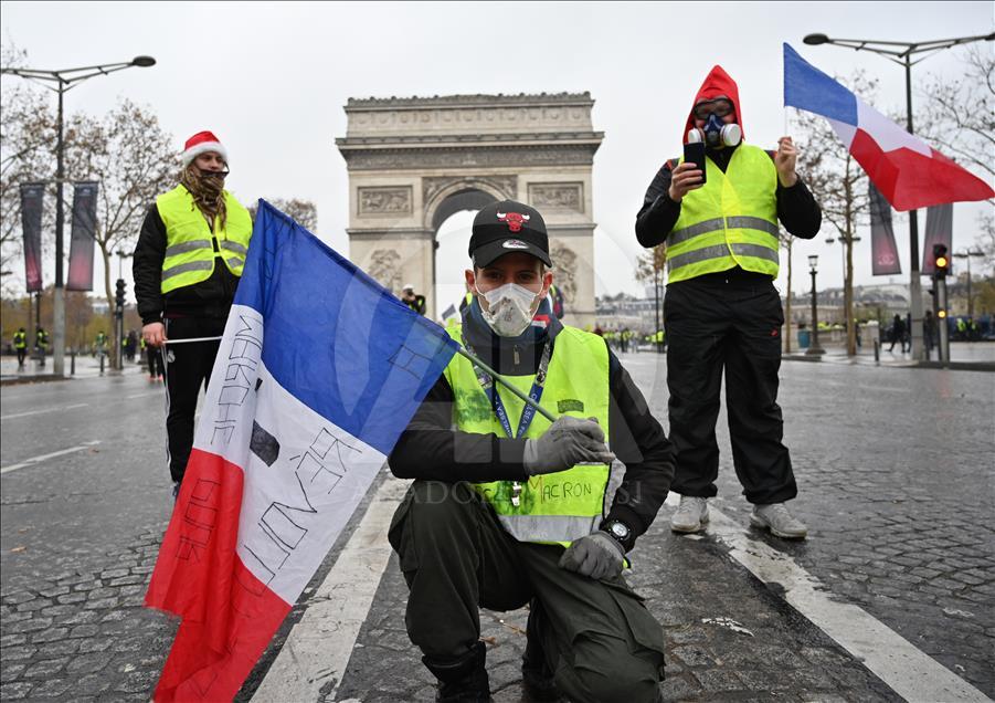 Yellow vest protest against rising fuel taxes in Paris