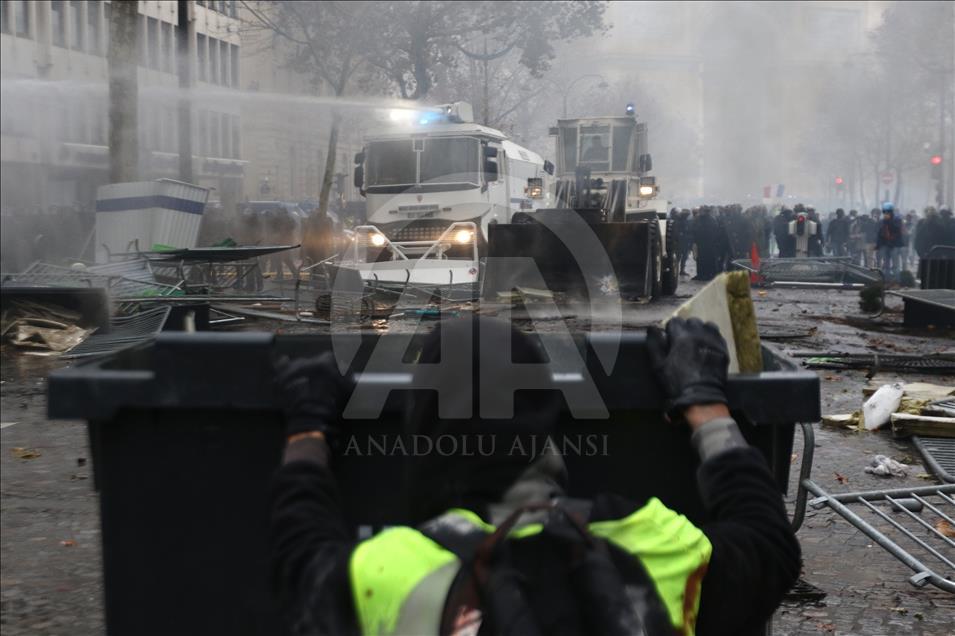 Yellow vest protest against rising fuel taxes in Paris