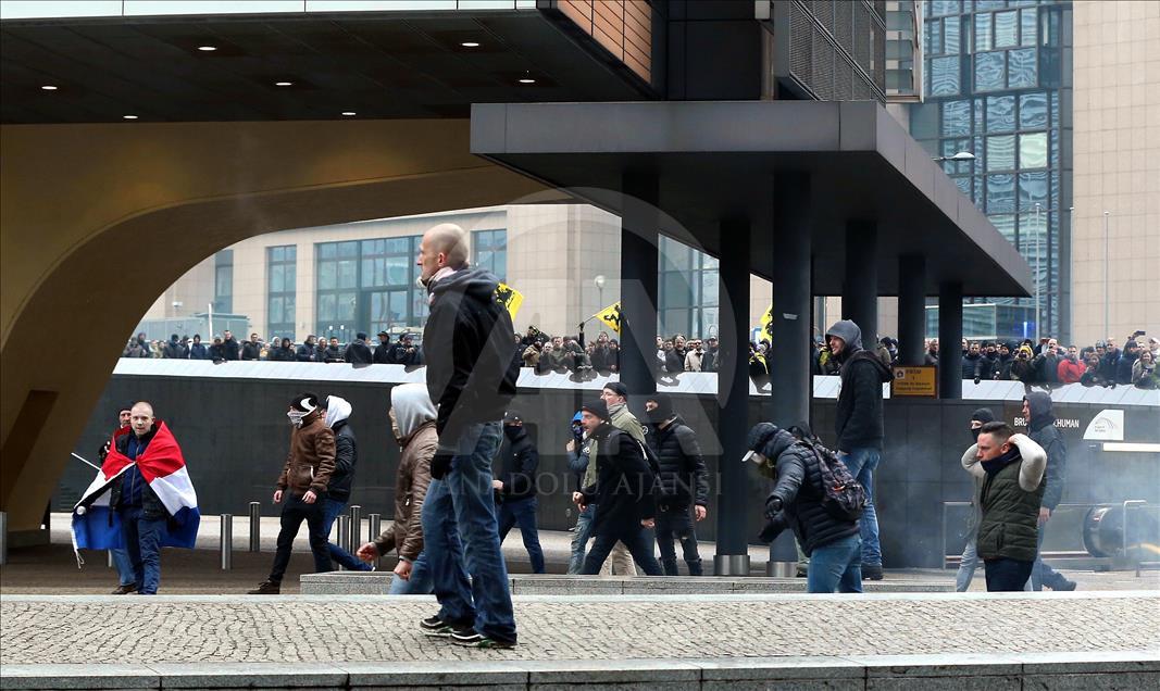 Belgian police use teargas on anti-migration protesters