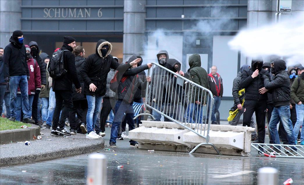 Belgian police use teargas on anti-migration protesters