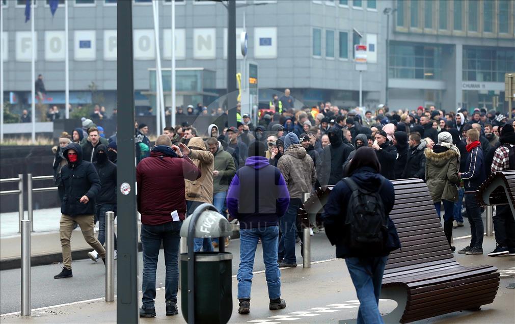 Belgian police use teargas on anti-migration protesters