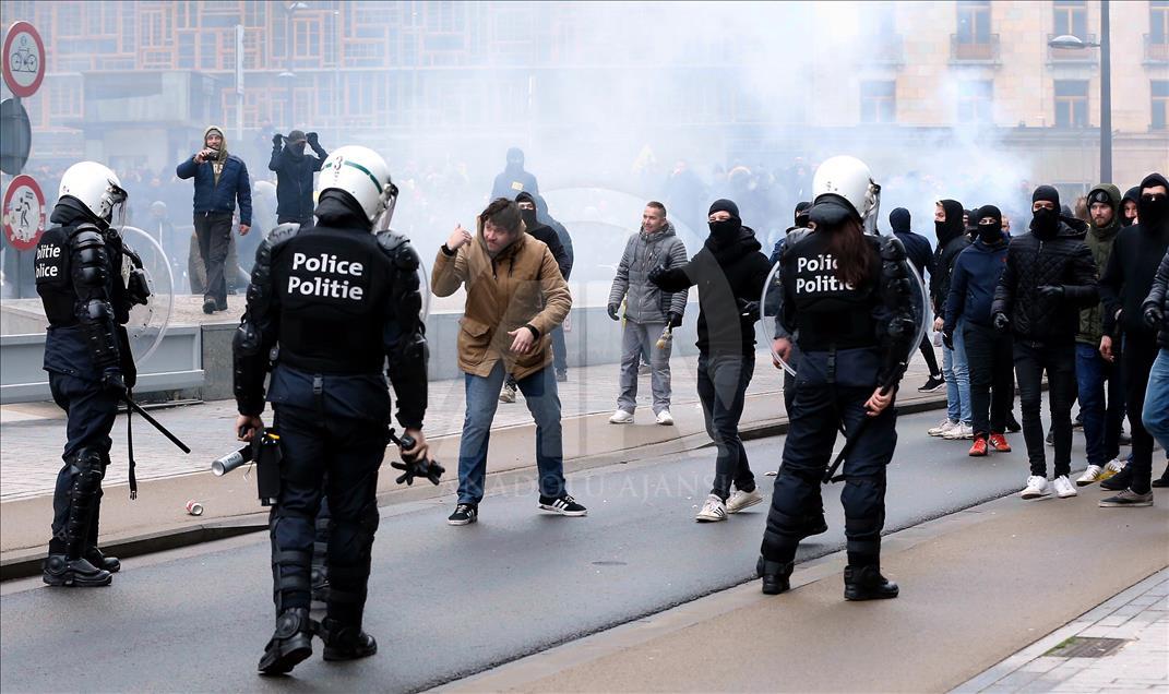 Belgian police use teargas on anti-migration protesters