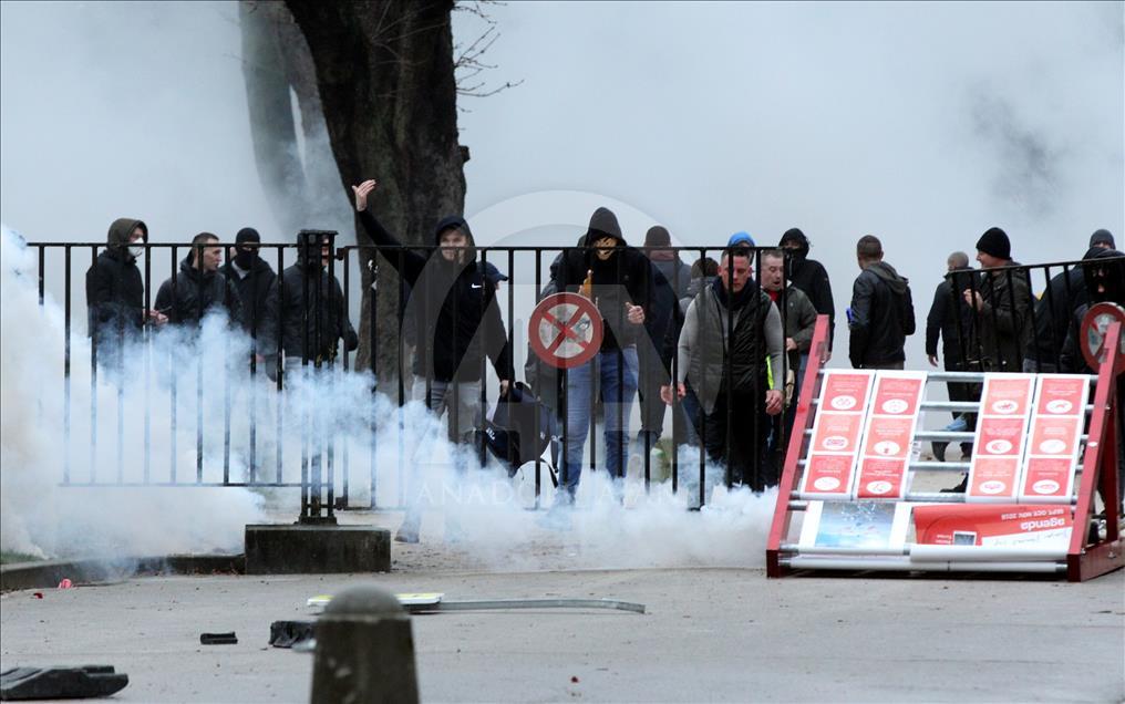 Belgian police use teargas on anti-migration protesters