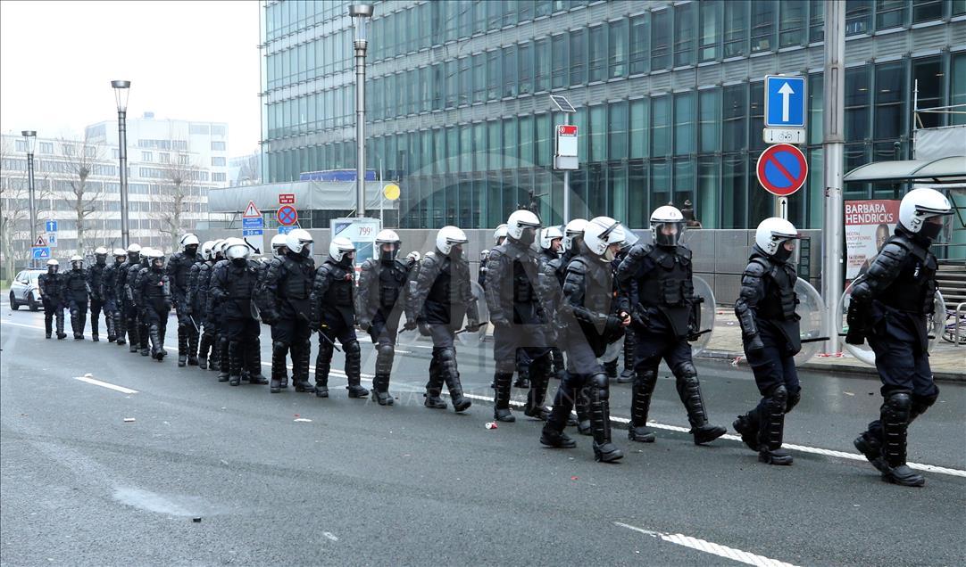 Belgian police use teargas on anti-migration protesters