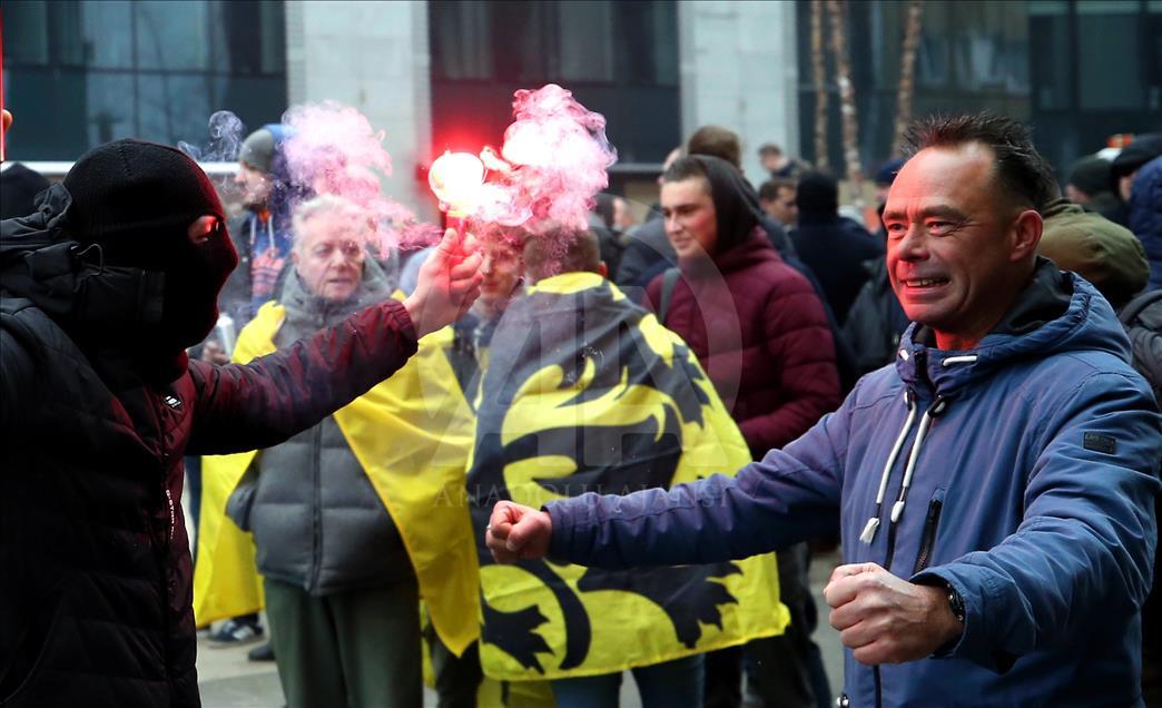 Belgian police use teargas on anti-migration protesters