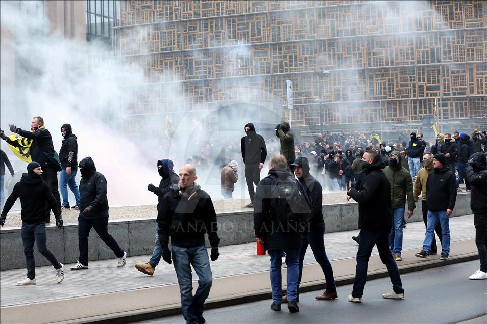 Belgian police use teargas on anti-migration protesters