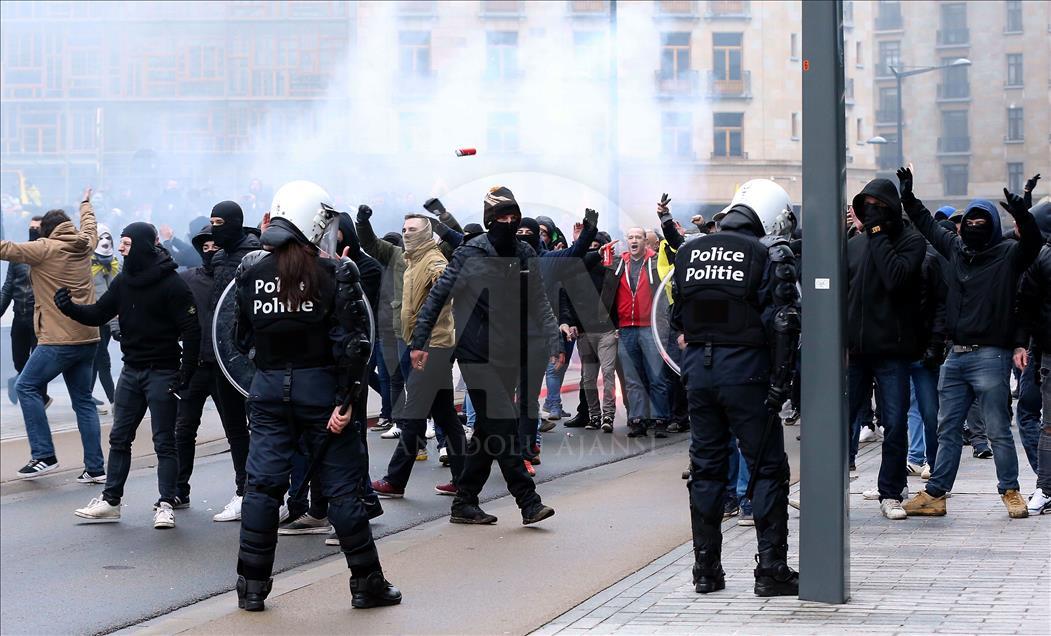 Belgian police use teargas on anti-migration protesters