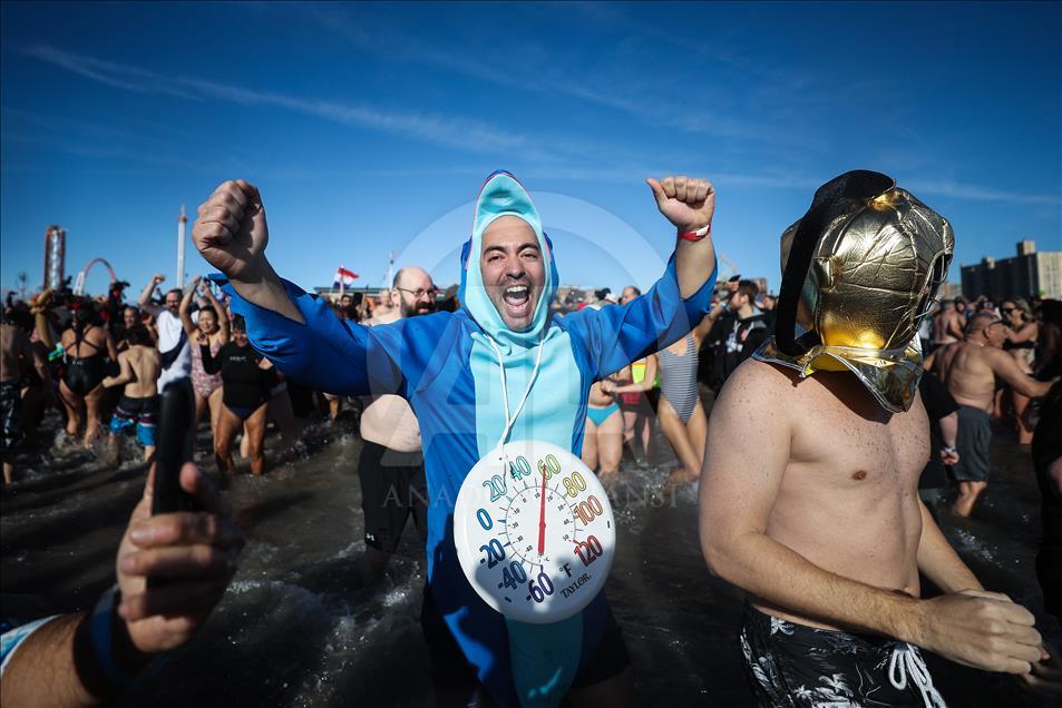 New Yorkers perform polar bear plunge at Coney Island