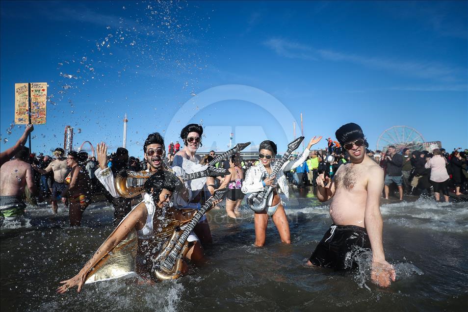 New Yorkers perform polar bear plunge at Coney Island