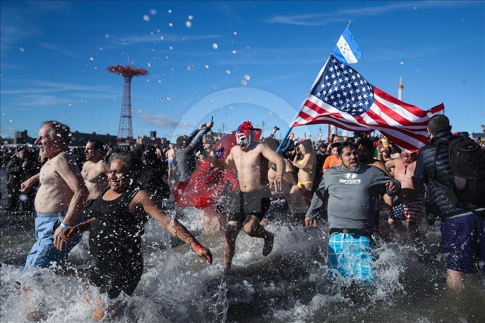 New Yorkers perform polar bear plunge at Coney Island