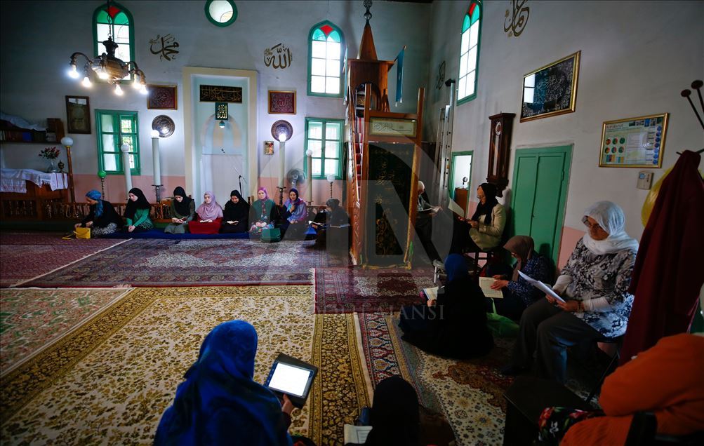 Muslim women in Bosnia and Herzegovina recite Quran during Ramadan