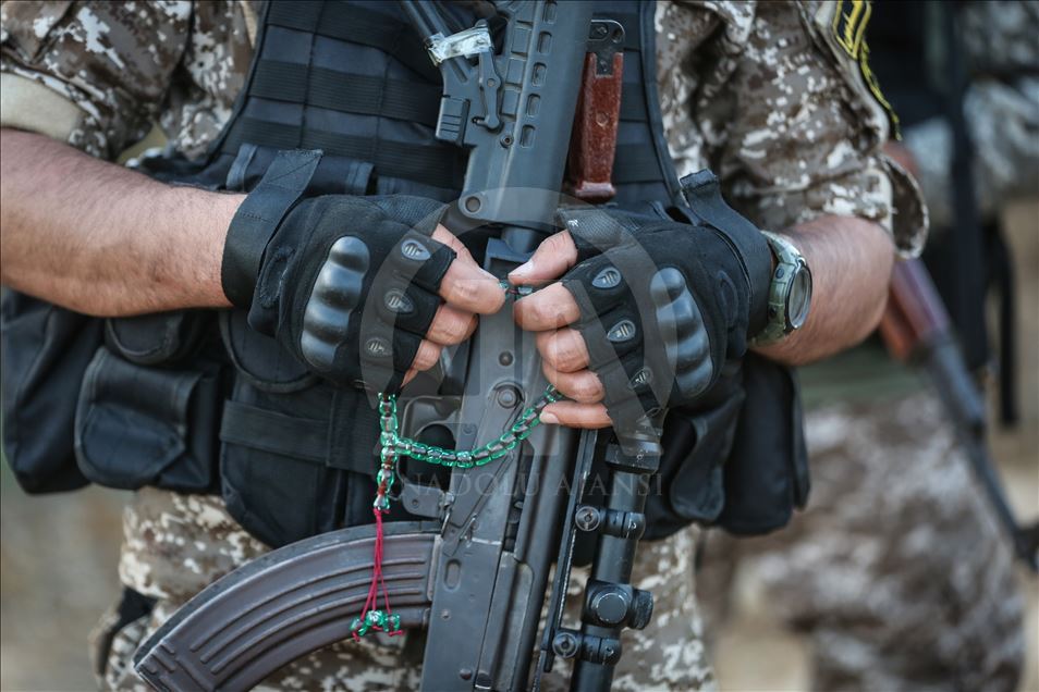 Members of Saraya al-Quds keep guard at Israeli border 