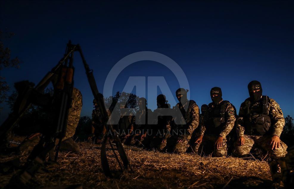 Members of Saraya al-Quds keep guard at Israeli border 