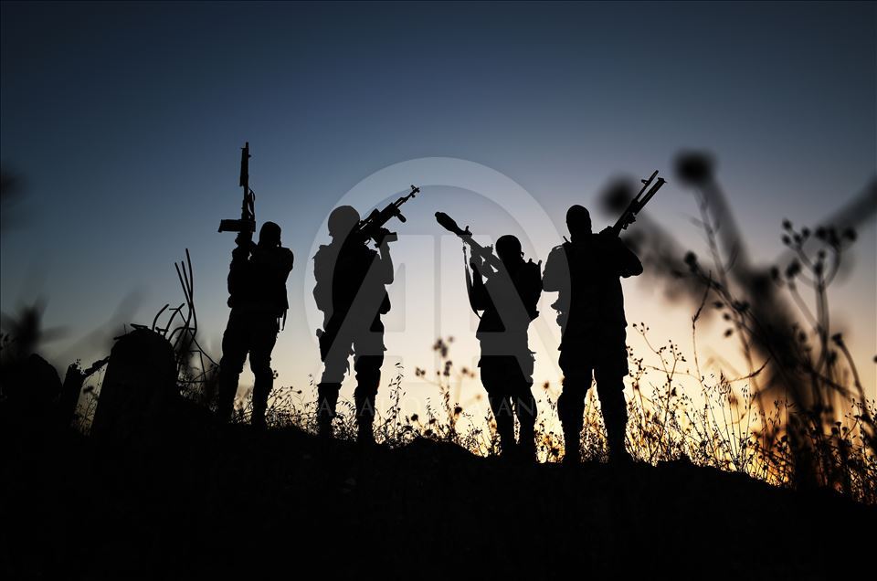 Members of Saraya al-Quds keep guard at Israeli border 