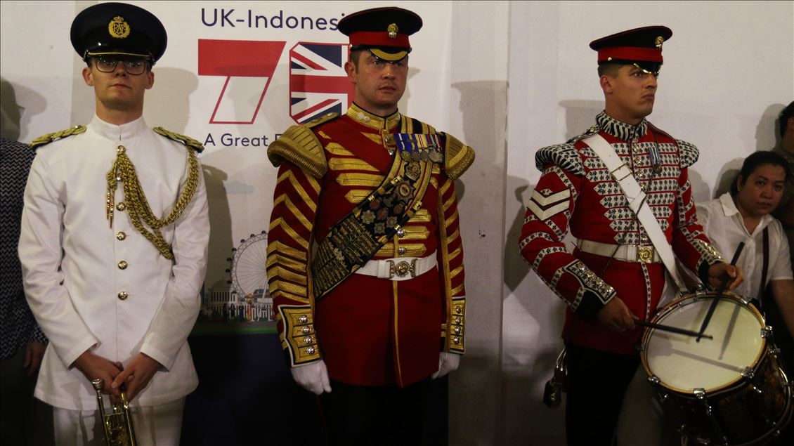 British military musicians play music at the Jakarta MRT station