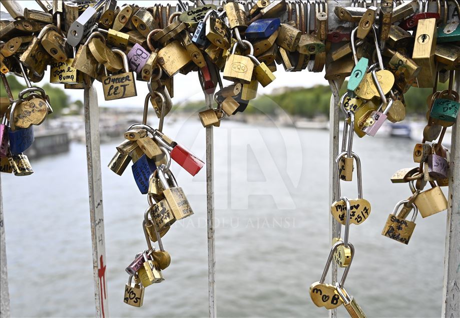 Love locks on the Debilly Passerelle over the Seine River in Paris