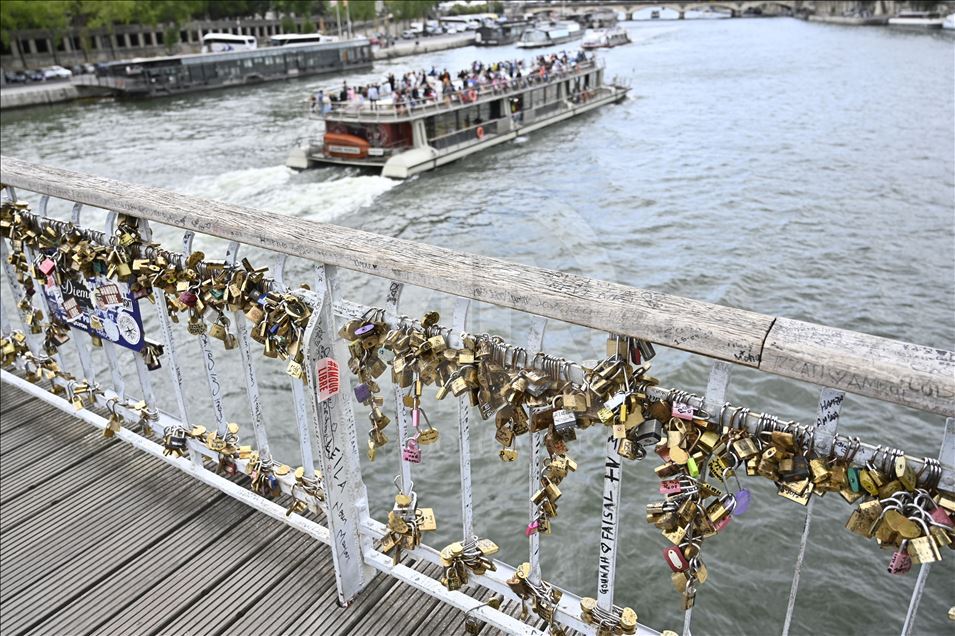 Love locks on the Debilly Passerelle over the Seine River in Paris