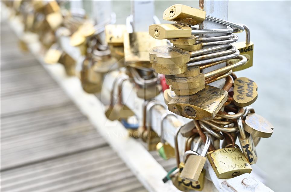 Love locks on the Debilly Passerelle over the Seine River in Paris