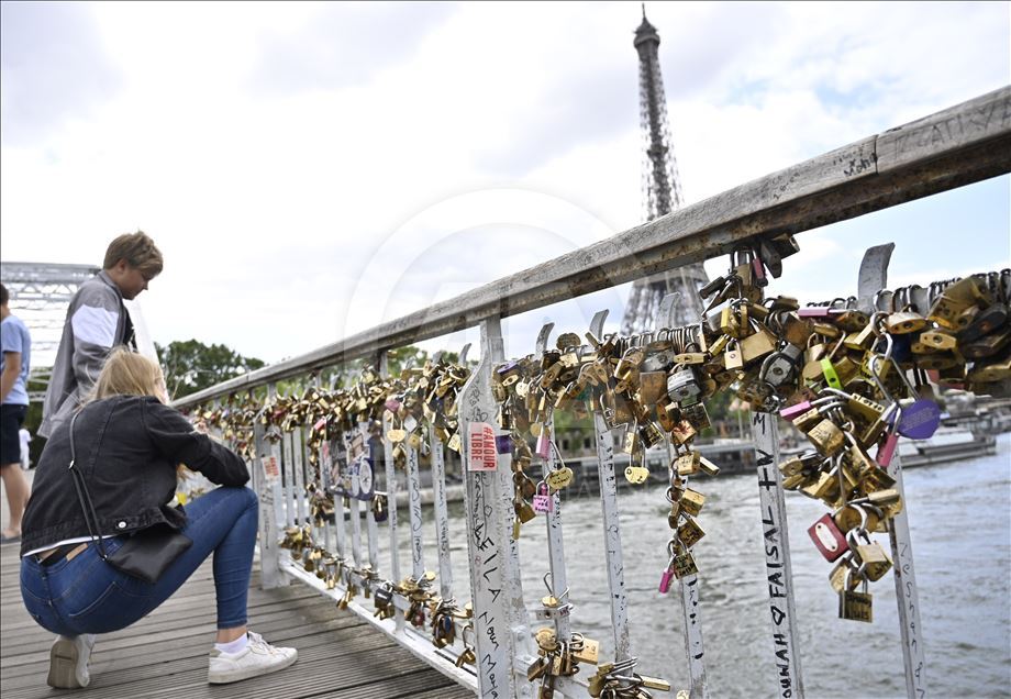 Love locks on the Debilly Passerelle over the Seine River in Paris