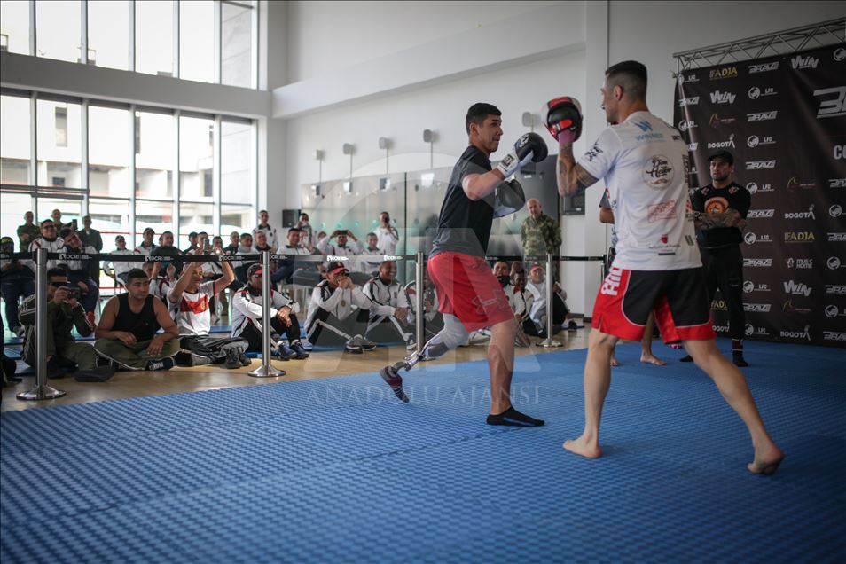 Landmine survivors practice MMA fight in Bogota
