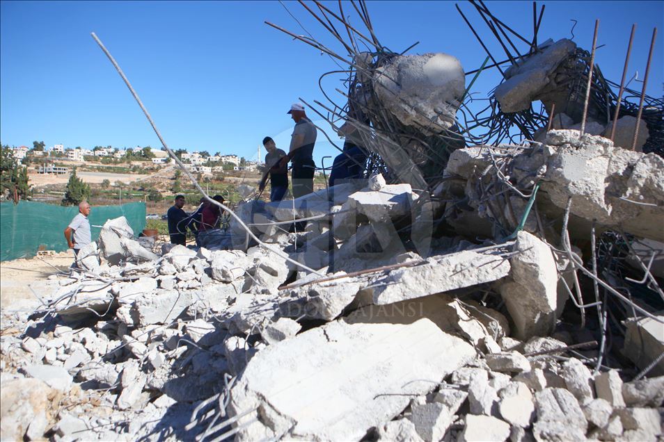 Israeli forces demolish a house of a Palestinian

