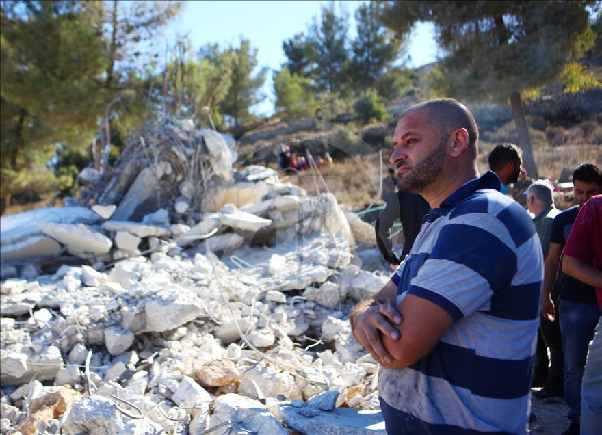 Israeli forces demolish a house of a Palestinian
