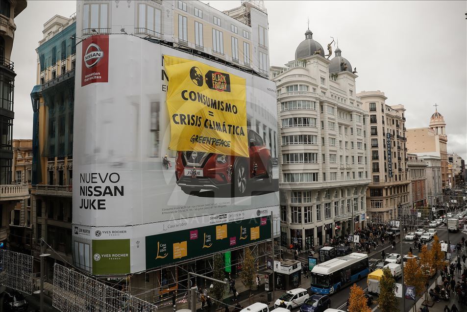Greenpeace activists protest in Madrid on Black Friday