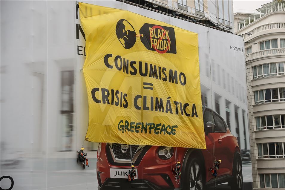 Greenpeace activists protest in Madrid on Black Friday