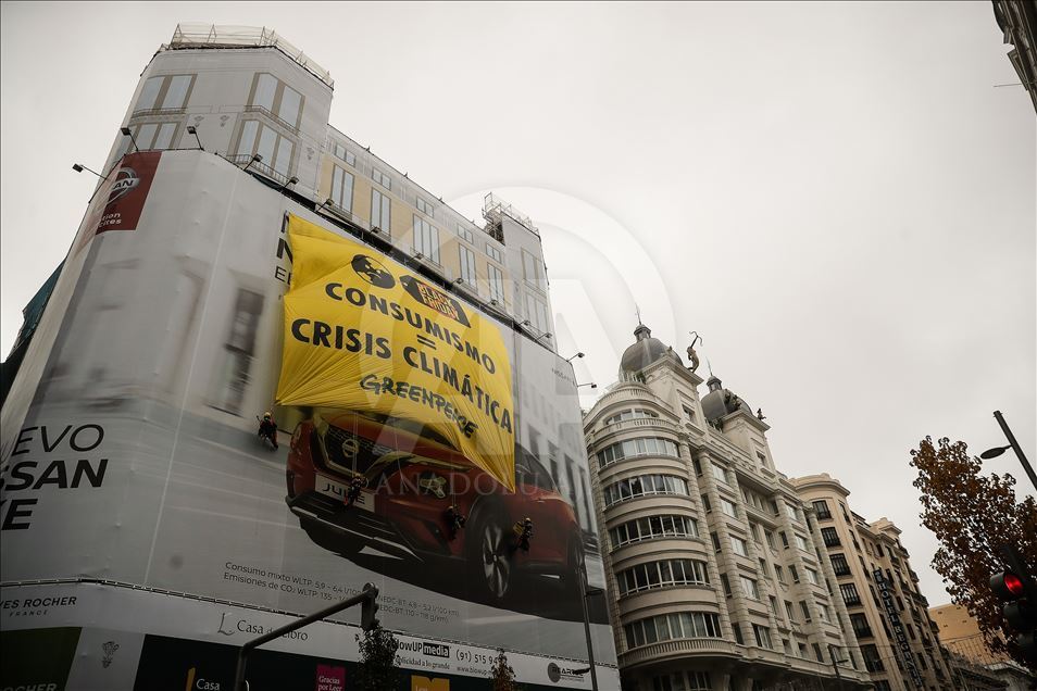 Greenpeace activists protest in Madrid on Black Friday