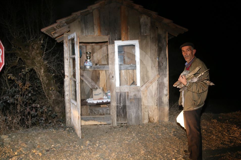 A local man heats the shack for students every morning in Turkey