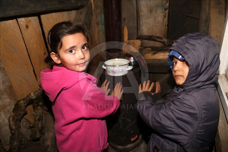 A local man heats the shack for students every morning in Turkey